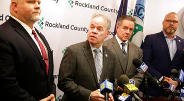 Rockland County Executive Ed Day, second from left, speaks at a news conference in New City, N.Y., Monday, Dec. 30, 2019. (AP Photo/Seth Wenig) Rockland County Executive Ed Day, second from left, speaks at a news conference in New City, N.Y., Monday, Dec. 30, 2019. (AP Photo/Seth Wenig)