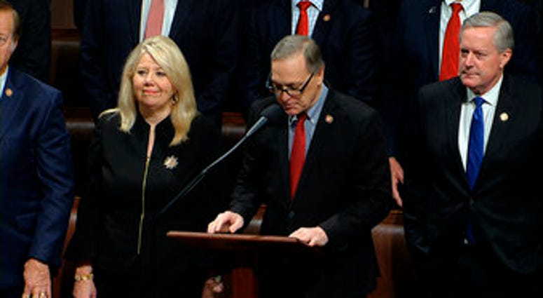 Rep. Andy Biggs, R-Ariz., makes a motion for the House to adjourn as the House of Representatives debates the articles of impeachment against President Donald Trump at the Capitol. (House Television via AP) Rep. Andy Biggs, R-Ariz., makes a motion for the House to adjourn as the House of Representatives debates the articles of impeachment against President Donald Trump at the Capitol. (House Television via AP)