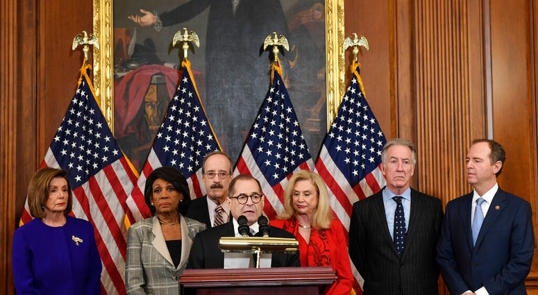 unveil articles of impeachment against President Donald Trump, during a news conference on Capitol Hill in Washington, Tuesday, Dec. 10, 2019.(AP Photo/Susan Walsh) unveil articles of impeachment against President Donald Trump, during a news conference on Capitol Hill in Washington, Tuesday, Dec. 10, 2019.(AP Photo/Susan Walsh)