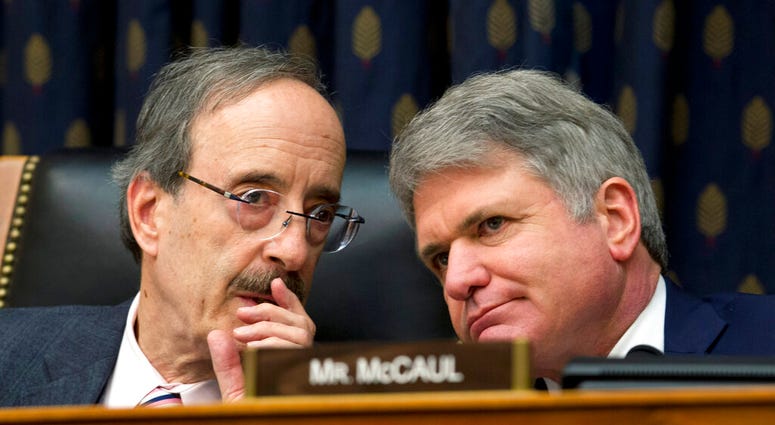 FILE - In this Feb. 13, 2019 file photo, House Foreign Affairs Committee Chairman Rep. Eliot Engel D-N.Y., left, speaks with Ranking member Rep. Michael McCaul, R-Texas during the House Foreign Affairs subcommittee hearing. (AP Photo/Jose Luis Magana)