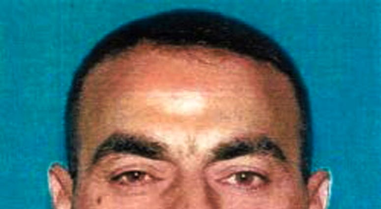 Undated photo provided by the U.S. Attorney's Office of Omar Abdulsattar Ameen. The refugee from Iraq was arrested on a warrant alleging that he killed an Iraqi policeman while fighting for the Islamic State. (U.S. Attorney's Office via AP)