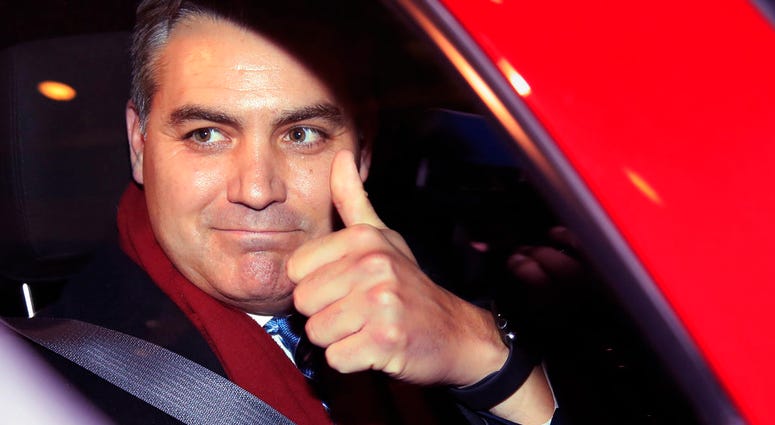 CNN's Jim Acosta gestures as he leaves federal court in Washington Nov. 14, 2018, following a hearing on a legal challenge against President Donald Trump's administration over the revocation of his White House hard pass. (AP Photo/Manuel Balce Ceneta)