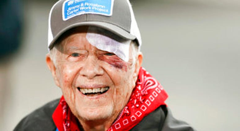 Carter has been hospitalized after an another fall at his home in Plains, Ga. A statement from The Carter Center says Carter suffered "a minor pelvic fracture" on Monday, Oct. 21 but remains in good spirits. (AP Photo/Mark Humphrey, File)