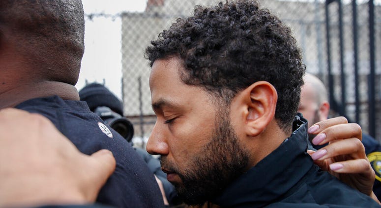 "Empire" actor Jussie Smollett leaves Cook County jail following his release, Thursday, Feb. 21, 2019, in Chicago. (AP Photo/Kamil Krzaczynski)