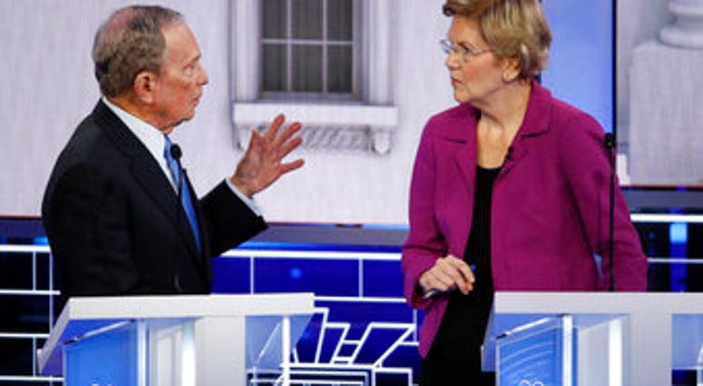 Democratic presidential candidate, former New York City Mayor Mike Bloomberg talks with Sen. Elizabeth Warren, D-Mass., during a break at a Democratic presidential primary debate Wednesday, Feb. 19, 2020, in Las Vegas. (AP Photo/John Locher) Democratic presidential candidate, former New York City Mayor Mike Bloomberg talks with Sen. Elizabeth Warren, D-Mass., during a break at a Democratic presidential primary debate Wednesday, Feb. 19, 2020, in Las Vegas. (AP Photo/John Locher)