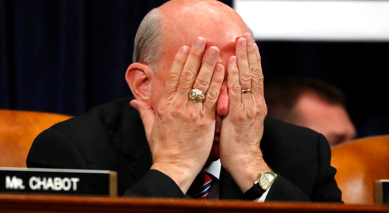 Rep. Louie Gohmert, R-Texas, rubs his face during a House Judiciary Committee markup of the articles of impeachment against President Donald Trump, Wednesday, Dec. 11, 2019, on Capitol Hill in Washington. (AP Photo/Jacquelyn Martin) Rep. Louie Gohmert, R-Texas, rubs his face during a House Judiciary Committee markup of the articles of impeachment against President Donald Trump, Wednesday, Dec. 11, 2019, on Capitol Hill in Washington. (AP Photo/Jacquelyn Martin)