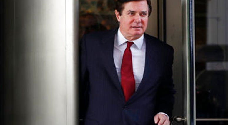 FILE- In this Nov. 6, 2017 file photo, Paul Manafort, President Donald Trump's former campaign chairman, leaves the federal courthouse in Washington. (AP Photo/Jacquelyn Martin) FILE- In this Nov. 6, 2017 file photo, Paul Manafort, President Donald Trump's former campaign chairman, leaves the federal courthouse in Washington. (AP Photo/Jacquelyn Martin)