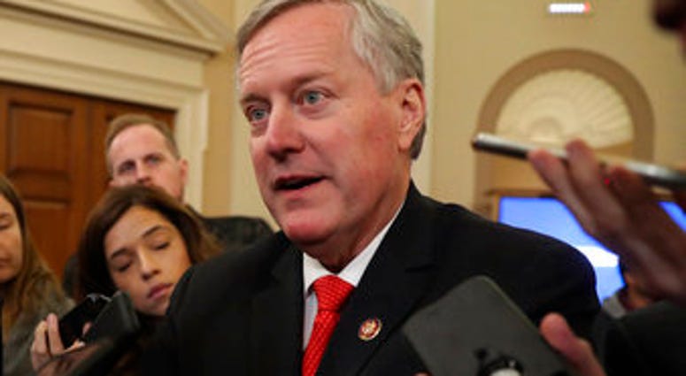 FILE - In this Nov. 13, 2019, file photo, Rep. Mark Meadows, R- N.C., speaks to reporters. (AP Photo/Andrew Harnik, File) FILE - In this Nov. 13, 2019, file photo, Rep. Mark Meadows, R- N.C., speaks to reporters. (AP Photo/Andrew Harnik, File)