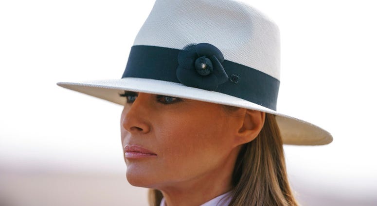 In this Oct. 6, 2018 photo, First lady Melania Trump pauses as she speaks to media during a visit to the historical Giza Pyramids site near Cairo, Egypt. First lady Melania Trump says she thinks she’s among the most bullied people in the world and there a