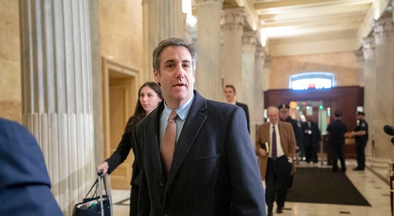 Michael Cohen, President Donald Trump's former lawyer, returns to Capitol Hill for a fourth day of testimony. (AP Photo/J. Scott Applewhite)