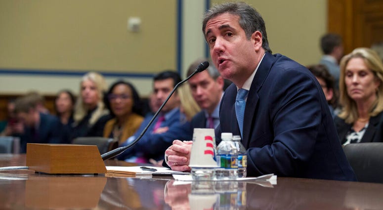 Michael Cohen, President Donald Trump's former lawyer, testifies before the House Oversight and Reform Committee, on Capitol Hill, Wednesday, Feb. 27, 2019, in Washington. (AP Photo/Alex Brandon)
