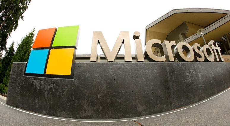 FILE - This July 3, 2014, file photo, shows the Microsoft Corp. logo outside the Microsoft Visitor Center in Redmond, Wash. Microsoft says hackers linked to the Iranian government have targeted a U.S. presidential campaign. (AP Photo Ted S. Warren, File)