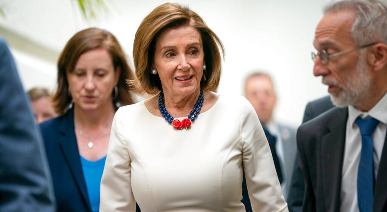 Speaker of the House Nancy Pelosi, D-Calif., leaves a caucus meeting on Capitol Hill in Washington, Wednesday, June 12, 2019. (AP Photo/J. Scott Applewhite)