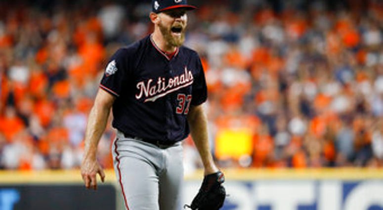 Washington Nationals starting pitcher Stephen Strasburg reacts after an out in the sixth inning of Game 2 of the World Series against the Houston Astros Wednesday, Oct. 23, 2019, in Houston. (AP Photo/Matt Slocum)
