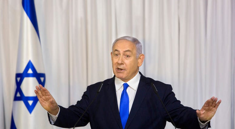 FILE - In this Thursday, Feb. 21, 2019 file photo, Israeli Prime Minister Benjamin Netanyahu delivers a statement in Ramat Gan, Israel. (AP Photo/Sebastian Scheiner, File)