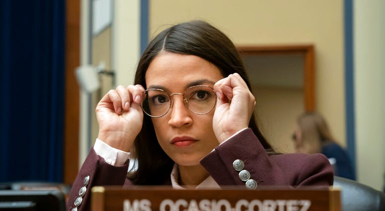Rep. Alexandria Ocasio-Cortez, D-N.Y., attends a House Oversight Committee hearing on high prescription drugs prices shortly after her private meeting with Speaker of the House Nancy Pelosi, D-Calif., on Capitol Hill. (AP Photo/J. Scott Applewhite)