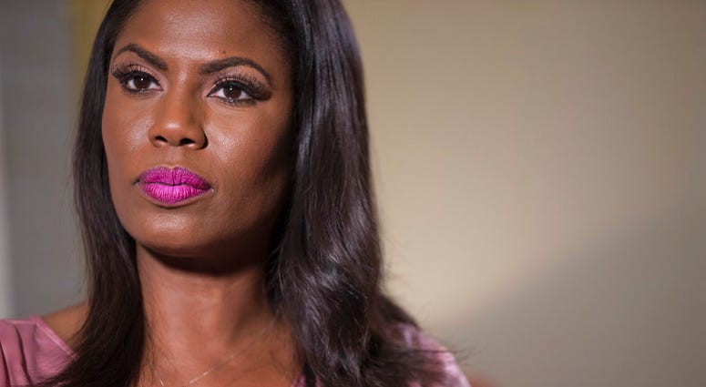 Television personality and former White House staffer Omarosa Manigault Newman listens during an interview with The Associated Press, Tuesday, Aug. 14, 2018, in New York. (AP Photo/Mary Altaffer)