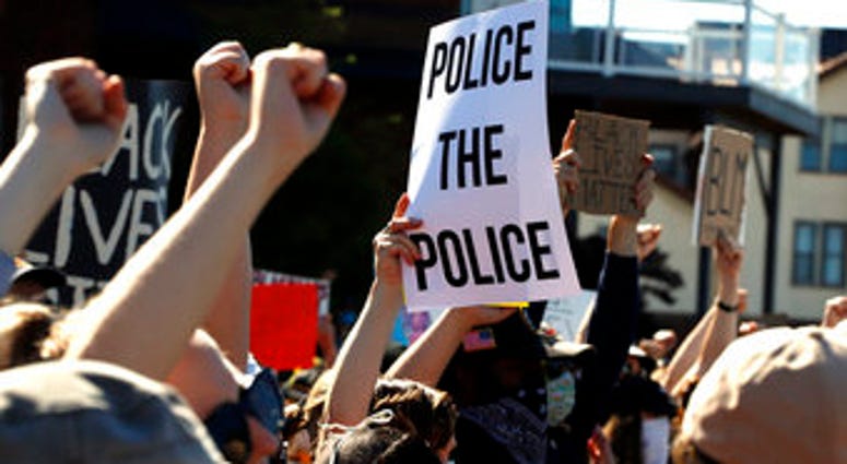 FILE - In this June 7, 2020, file photo, protesters participate in a Black Lives Matter rally on Mount Washington overlooking downtown Pittsburgh, to protest the death of George Floyd. (AP Photo/Gene J. Puskar, File) FILE - In this June 7, 2020, file photo, protesters participate in a Black Lives Matter rally on Mount Washington overlooking downtown Pittsburgh, to protest the death of George Floyd. (AP Photo/Gene J. Puskar, File)