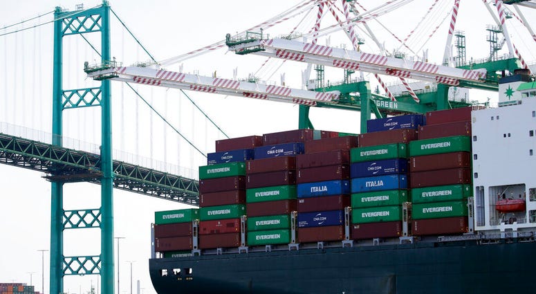 FILE - In this June 19, 2019, file photo a cargo ship is docked at the Port of Los Angeles. On Nov. 27, the Commerce Department issues the second estimate of how the U.S. economy performed in the July-September quarter. (AP Photo/Marcio Jose Sanchez, File FILE - In this June 19, 2019, file photo a cargo ship is docked at the Port of Los Angeles. On Nov. 27, the Commerce Department issues the second estimate of how the U.S. economy performed in the July-September quarter. (AP Photo/Marcio Jose Sanchez, File