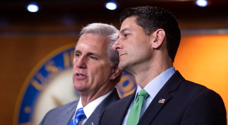House Majority Leader Kevin McCarthy, R-Calif., and Speaker of the House Paul Ryan, R-Wis., confer during a news conference following a closed-door GOP meeting on immigration, on Capitol Hill in Washington, Wednesday, June 13, 2018. (AP)