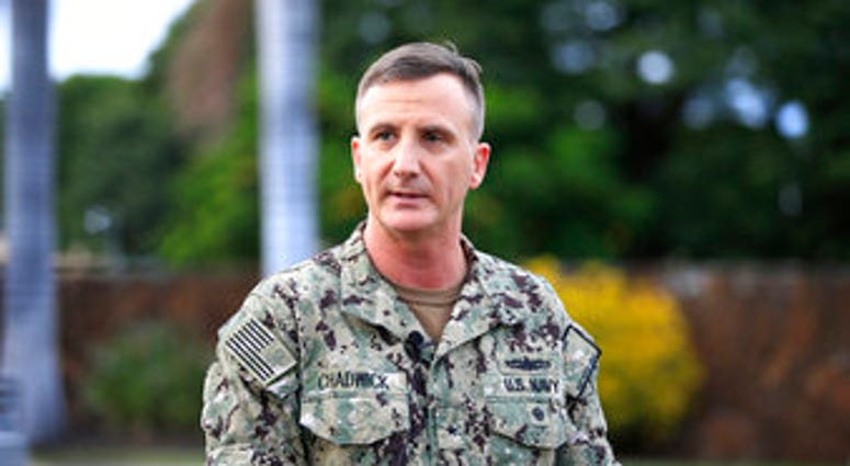 U.S. Navy Rear Adm. Robb Chadwick speaks to the media at the main gate at Joint Base Pearl Harbor-Hickam, Wednesday, Dec. 4, 2019, in Hawaii, following a shooting. (AP Photo/Marco Garcia) U.S. Navy Rear Adm. Robb Chadwick speaks to the media at the main gate at Joint Base Pearl Harbor-Hickam, Wednesday, Dec. 4, 2019, in Hawaii, following a shooting. (AP Photo/Marco Garcia)