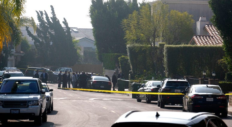Police investigate a Hollywood Hills home where a fatal shooting occurred on Wednesday, Feb. 19, 2020, in Los Angeles. (AP Photo/Ringo H.W. Chiu) Police investigate a Hollywood Hills home where a fatal shooting occurred on Wednesday, Feb. 19, 2020, in Los Angeles. (AP Photo/Ringo H.W. Chiu)
