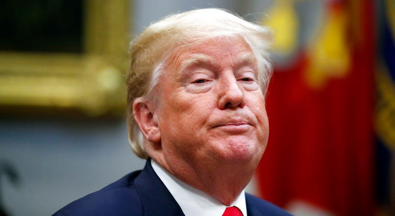 President Donald Trump pauses while speaking during a discussion for drug-free communities support programs, in the Roosevelt Room of the White House, Wednesday, Aug. 29, 2018, in Washington. (AP Photo/Alex Brandon)