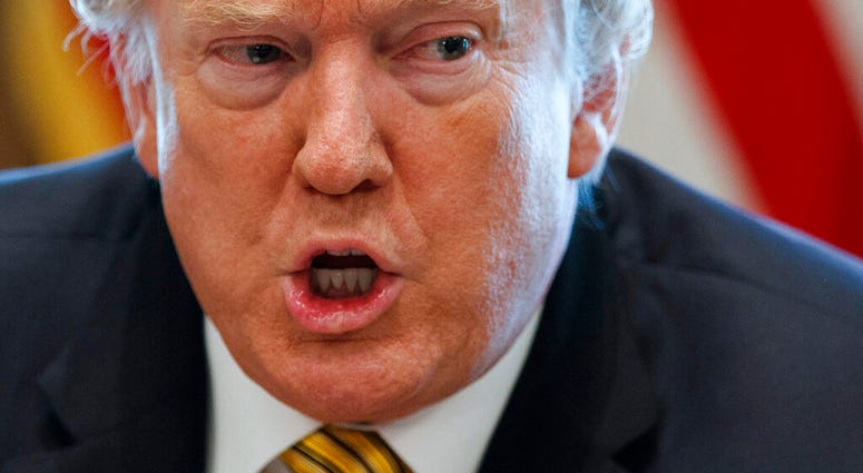 President Donald Trump speaks during the White House Opportunity and Revitalization Council meeting in the Cabinet Room of the White House, Thursday, April 4, 2019, in Washington. (AP Photo/Evan Vucci)