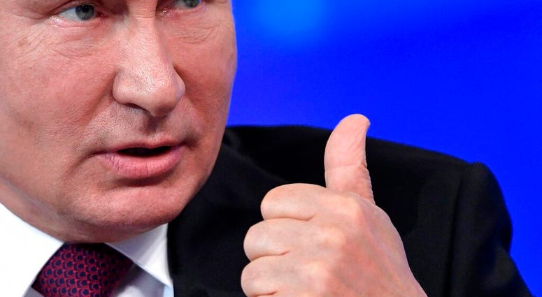Russian President Vladimir Putin gestures while speaking during his annual call-in show in Moscow, Russia, Thursday, June 20, 2019. (Alexei Nikolsky, Sputnik, Kremlin Pool Photo via AP)