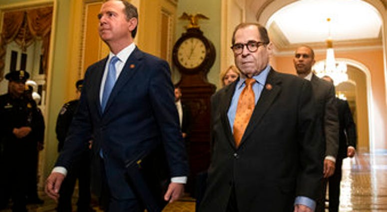 House Intelligence Committee Chairman Adam Schiff, D-Calif., front left, and House Judiciary Committee Chairman, Rep. Jerrold Nadler, D-N.Y., and other House impeachment managers, walk to the Senate chamber. (AP Photo/Matt Rourke) House Intelligence Committee Chairman Adam Schiff, D-Calif., front left, and House Judiciary Committee Chairman, Rep. Jerrold Nadler, D-N.Y., and other House impeachment managers, walk to the Senate chamber. (AP Photo/Matt Rourke)