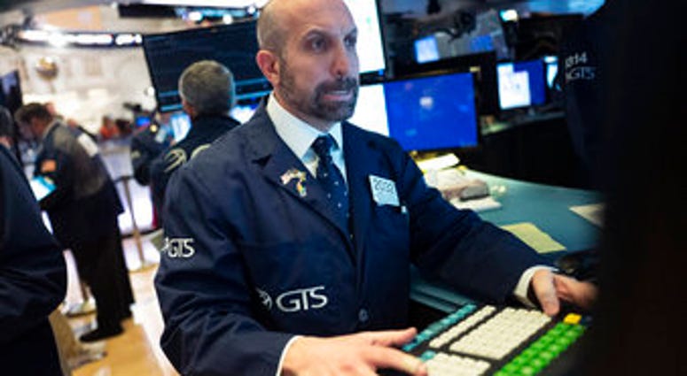 James Denaro monitors stock prices at the New York Stock Exchange, Wednesday, Feb. 26, 2020. (AP Photo/Mark Lennihan) James Denaro monitors stock prices at the New York Stock Exchange, Wednesday, Feb. 26, 2020. (AP Photo/Mark Lennihan)