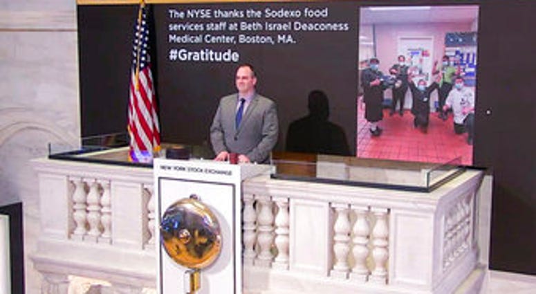 In this image taken from video provided by the New York Stock Exchange, Tommy Gannon, Assistant Supervisor, Facilities, rings the opening bell at the NYSE. (New York Stock Exchange via AP) In this image taken from video provided by the New York Stock Exchange, Tommy Gannon, Assistant Supervisor, Facilities, rings the opening bell at the NYSE. (New York Stock Exchange via AP)