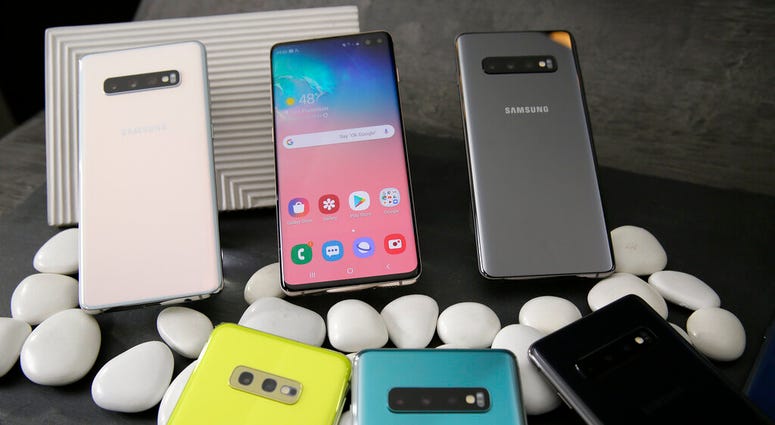 In this Tuesday, Feb. 19, 2019, photo is a selection of the new Samsung Galaxy S10 smartphones during a product preview in San Francisco. (AP Photo/Eric Risberg)