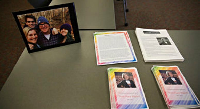 FILE - In this Dec. 21, 2019 file photo, photos, articles and letters are laid out on display before a ceremony honoring Tessa Majors at St. Anne's Belfield School in Charlottesville, Va. (Erin Edgerton/The Daily Progress via AP, File) FILE - In this Dec. 21, 2019 file photo, photos, articles and letters are laid out on display before a ceremony honoring Tessa Majors at St. Anne's Belfield School in Charlottesville, Va. (Erin Edgerton/The Daily Progress via AP, File)