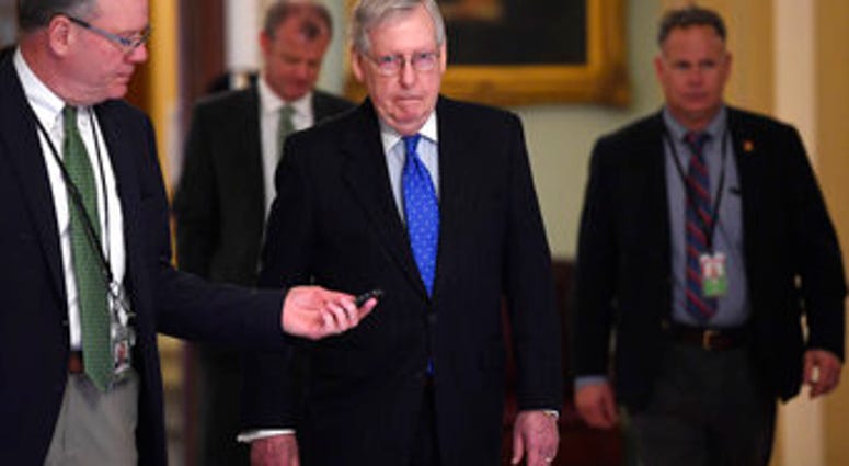 Senate Majority Leader Mitch McConnell of Ky., walks back to his office on Capitol Hill in Washington, Tuesday, March 17, 2020. (AP Photo/Susan Walsh) Senate Majority Leader Mitch McConnell of Ky., walks back to his office on Capitol Hill in Washington, Tuesday, March 17, 2020. (AP Photo/Susan Walsh)