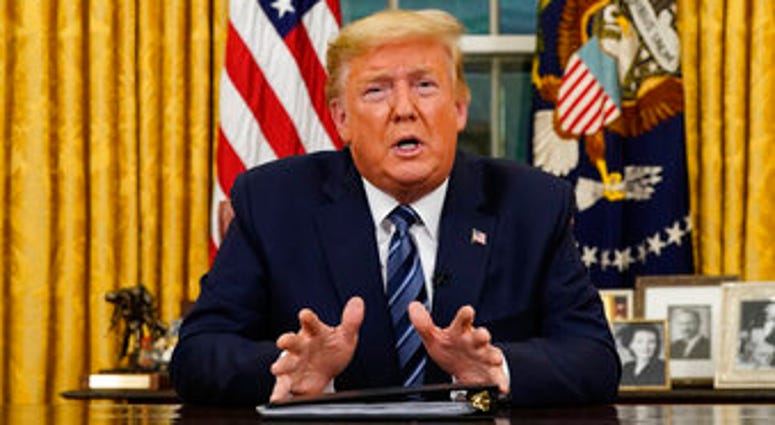 President Donald Trump speaks in an address to the nation from the Oval Office at the White House about the coronavirus Wednesday, March, 11, 2020, in Washington. (Doug Mills/The New York Times via AP, Pool) President Donald Trump speaks in an address to the nation from the Oval Office at the White House about the coronavirus Wednesday, March, 11, 2020, in Washington. (Doug Mills/The New York Times via AP, Pool)
