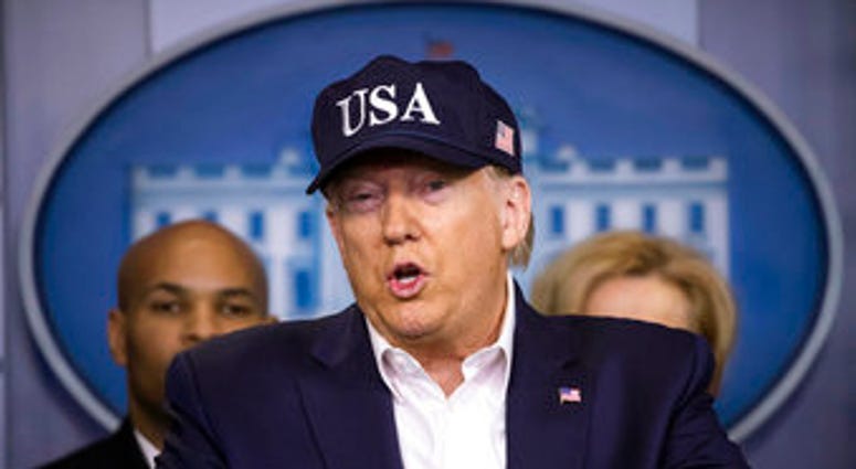 FILE - In this March 14, 2020 file photo, President Donald Trump speaks during a news conference about the coronavirus in the James Brady Briefing Room at the White House in Washington. (AP Photo/Alex Brandon) FILE - In this March 14, 2020 file photo, President Donald Trump speaks during a news conference about the coronavirus in the James Brady Briefing Room at the White House in Washington. (AP Photo/Alex Brandon)