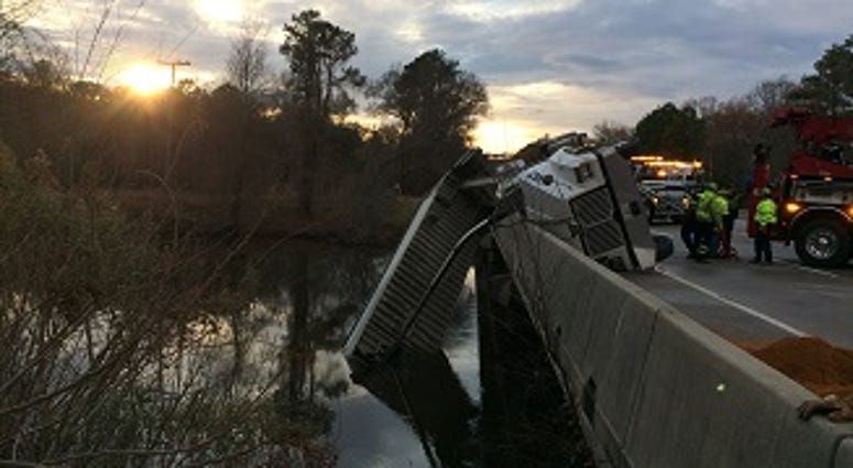 A tractor trailer hangs over the side of Route 60 at the Chickahominy River. (Virginia State Police) A tractor trailer hangs over the side of Route 60 at the Chickahominy River. (Virginia State Police)
