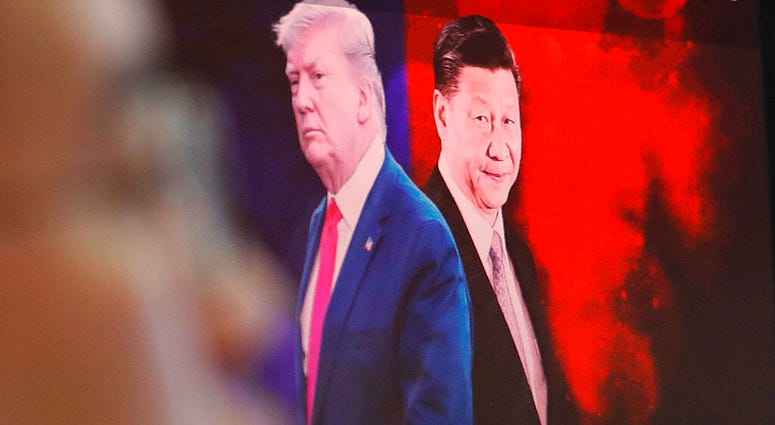 China will lift punitive tariffs imposed on U.S. soybeans and pork in a trade war with Washington, a state news agency said Friday, Sept. 13, 2019, in a possible goodwill gesture ahead of negotiations. (AP Photo/Ahn Young-joon, File)