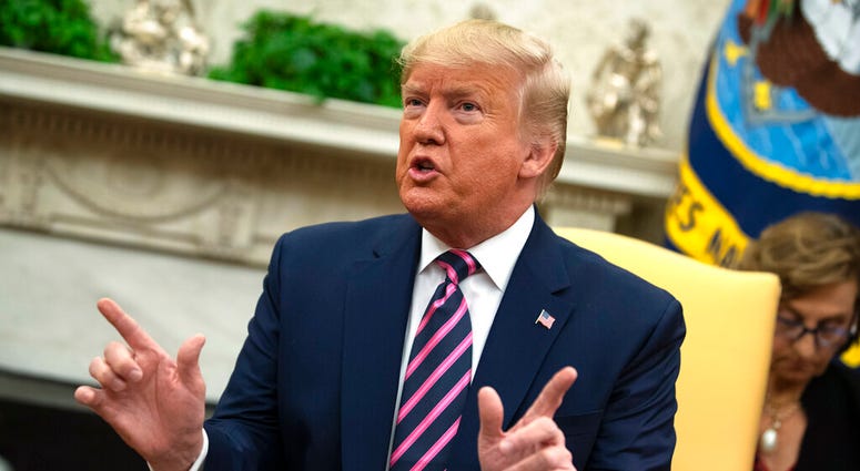 President Donald Trump speaks during a meeting with Paraguay's President Mario Abdo Benitez in the Oval Office of the White House, Friday, Dec. 13, 2019, in Washington. (AP Photo/ Evan Vucci) President Donald Trump speaks during a meeting with Paraguay's President Mario Abdo Benitez in the Oval Office of the White House, Friday, Dec. 13, 2019, in Washington. (AP Photo/ Evan Vucci)