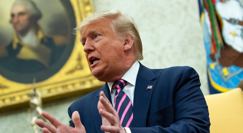 President Donald Trump speaks during a meeting with Paraguay's President Mario Abdo Benitez in the Oval Office of the White House, Friday, Dec. 13, 2019, in Washington. (AP Photo/ Evan Vucci) President Donald Trump speaks during a meeting with Paraguay's President Mario Abdo Benitez in the Oval Office of the White House, Friday, Dec. 13, 2019, in Washington. (AP Photo/ Evan Vucci)