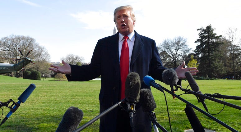 President Donald Trump talks with reporters before boarding Marine One on the South Lawn of the White House in Washington. Trump has been dealt a second setback in a week for his administration's health care initiatives. (AP Photo/Susan Walsh)