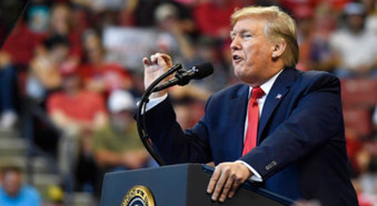 President Donald Trump speaks at a campaign rally in Sunrise, Fla., Tuesday, Nov. 26, 2019. (AP Photo/Susan Walsh) President Donald Trump speaks at a campaign rally in Sunrise, Fla., Tuesday, Nov. 26, 2019. (AP Photo/Susan Walsh)