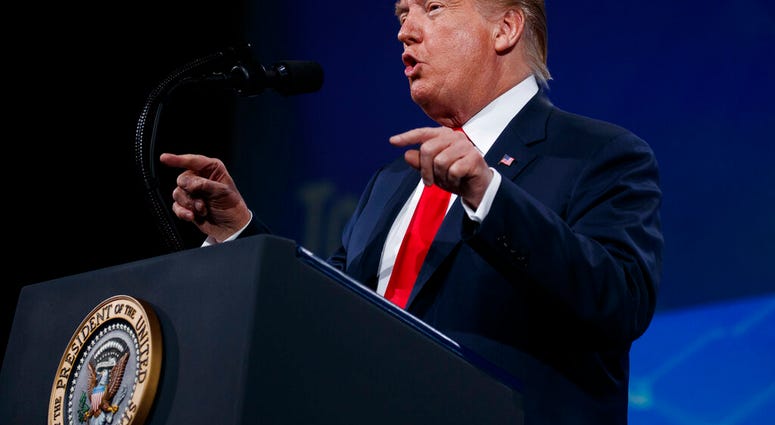 President Donald Trump speaks to the annual meeting of the National Rifle Association, Friday, April 26, 2019, in Indianapolis. (AP Photo/Evan Vucci)
