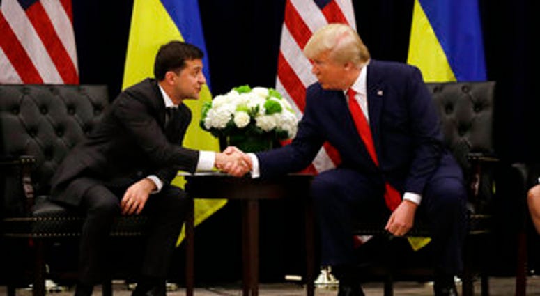 FILE - In this Wednesday, Sept. 25, 2019 file photo, President Trump meets with Ukrainian President Volodymyr Zelenskiy at the InterContinental Barclay New York hotel during the United Nations General Assembly in New York. (AP Photo/Evan Vucci, File)