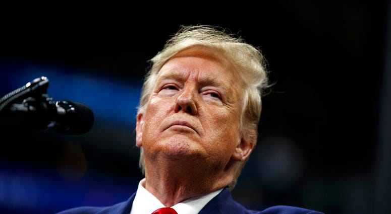 President Donald Trump speaks at a campaign rally at the Target Center, Thursday, Oct. 10, 2019, in Minneapolis. (AP Photo/Evan Vucci)