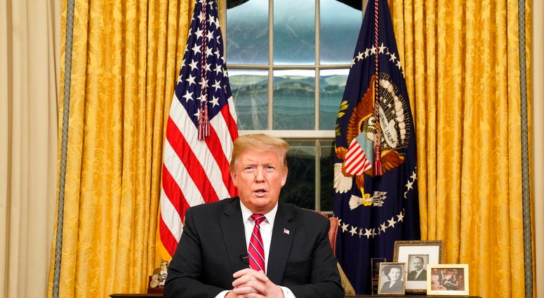 President Donald Trump speaks from the Oval Office of the White House as he gives a prime-time address about border security Tuesday, Jan. 8, 2018, in Washington. (Carlos Barria/Pool Photo via AP)