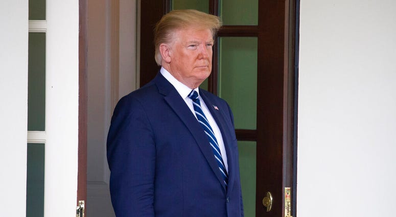President Donald Trump awaits the arrival of Canadian Prime Minister Justin Trudeau to the White House, Thursday, June 20, 2019, in Washington. (AP Photo/Alex Brandon)