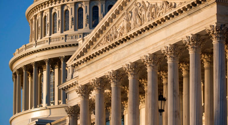 FILE - In this Jan. 25, 2017, file photo, the Capitol in Washington at sunrise. (AP Photo/J. Scott Applewhite, File)