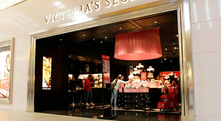 FILE - In this June 7, 2017 file photo, shoppers look at merchandise at a Victoria's Secret store. (AP Photo/Alan Diaz, File) FILE - In this June 7, 2017 file photo, shoppers look at merchandise at a Victoria's Secret store. (AP Photo/Alan Diaz, File)